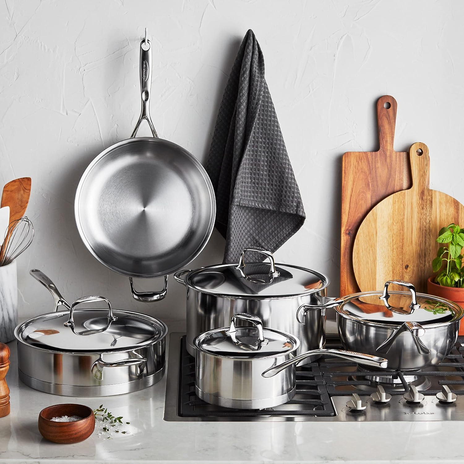 10-piece stainless steel cookware set with lids, including saucepans, fry pans, and stockpot for stovetop cooking — view 3