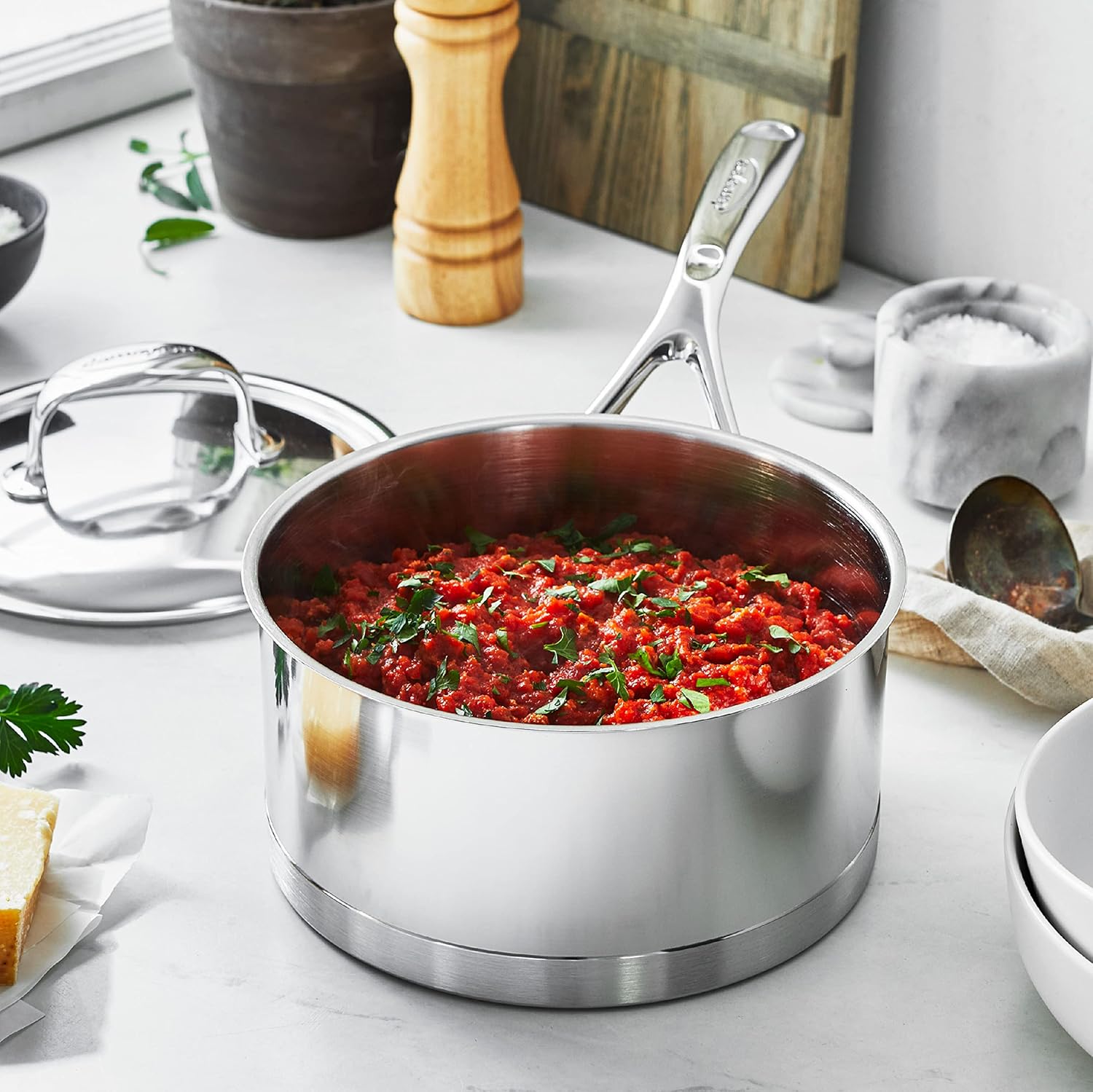 10-piece stainless steel cookware set with lids, including saucepans, fry pans, and stockpot for stovetop cooking — view 2