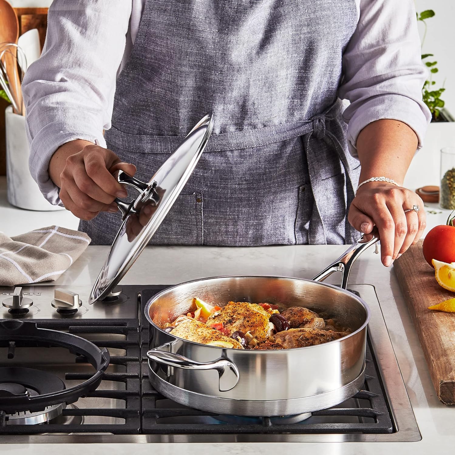 10-piece stainless steel cookware set with lids, including saucepans, fry pans, and stockpot for stovetop cooking — view 4