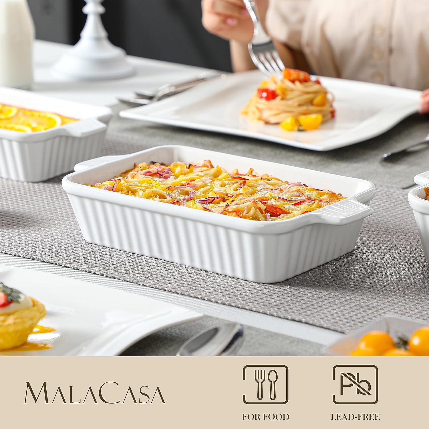 Set of 4 white ceramic rectangular baking dishes with handles, graduated sizes for lasagna and cake baking — detail