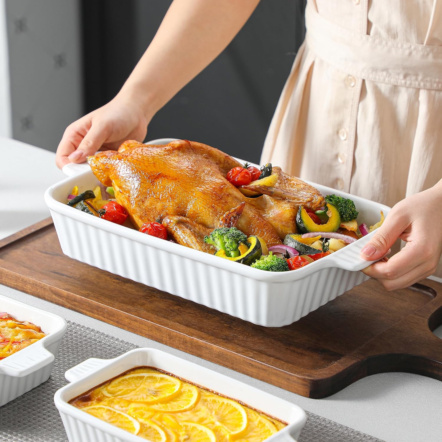 Set of 4 white ceramic rectangular baking dishes with handles, graduated sizes for lasagna and cake baking — view 5