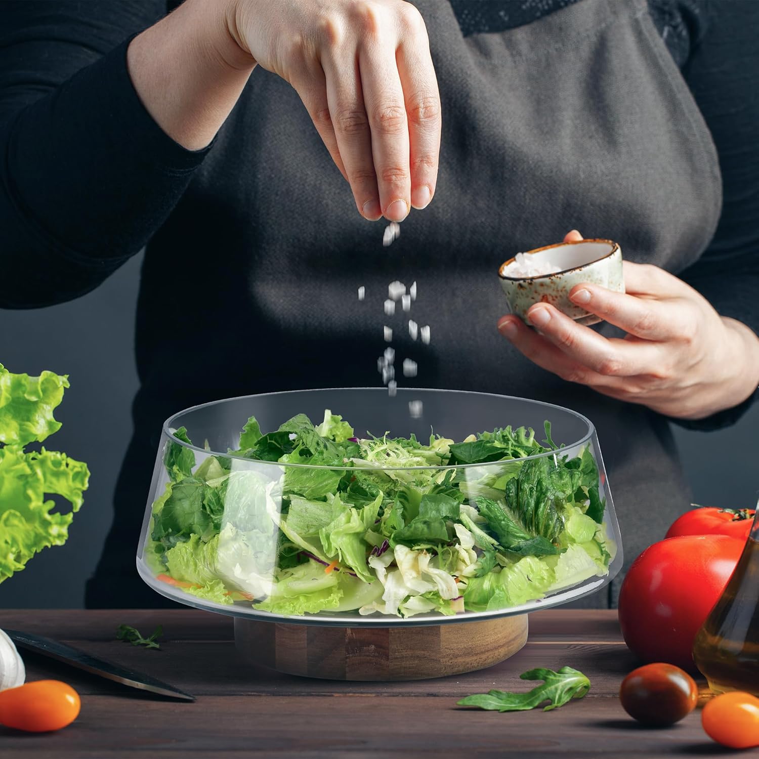 Extra-large glass salad bowl with acacia wood base and serving utensils — view 3
