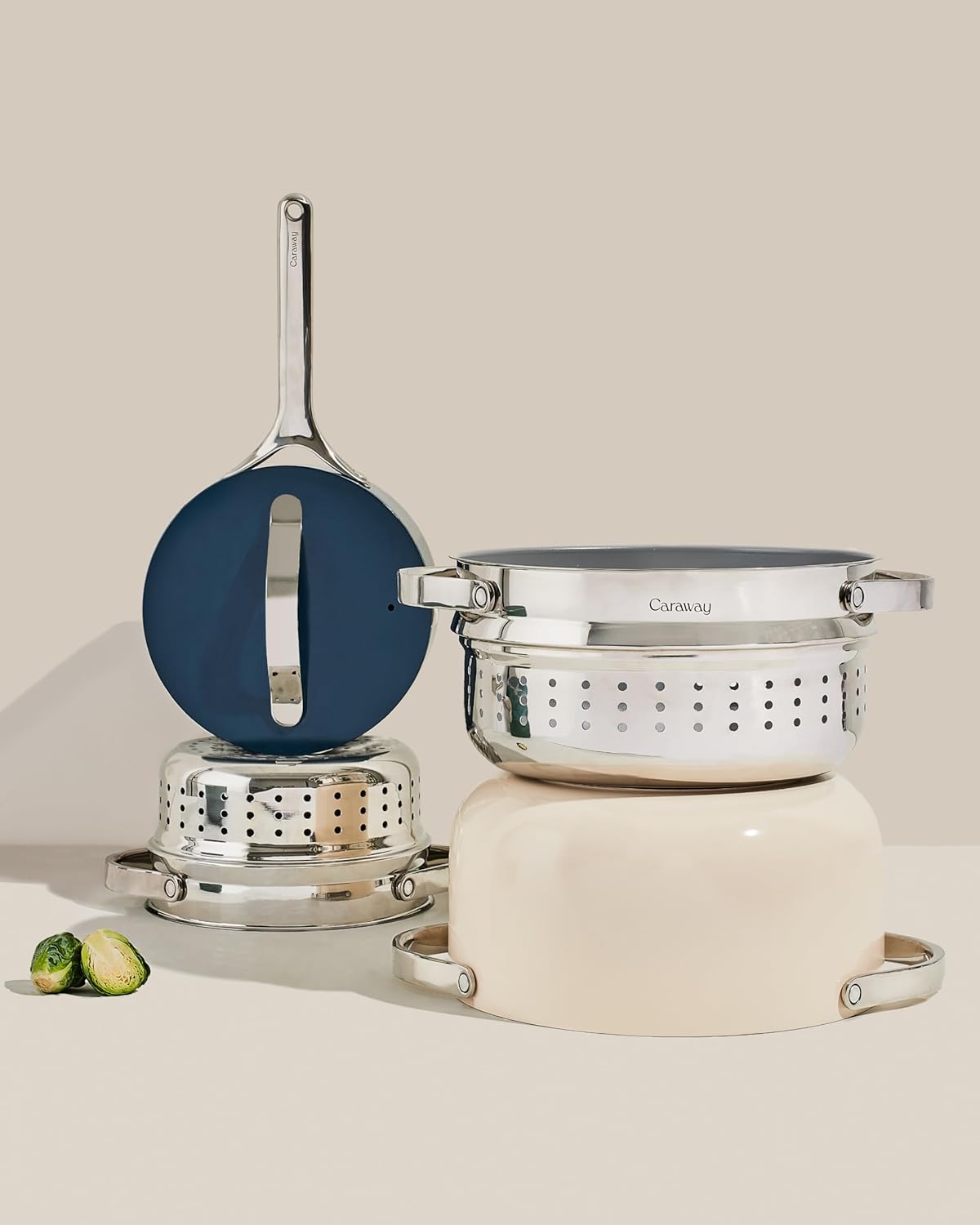 Caraway stainless steel steamer basket with handles, shown in small and large sizes for vegetable and seafood steaming — view 4