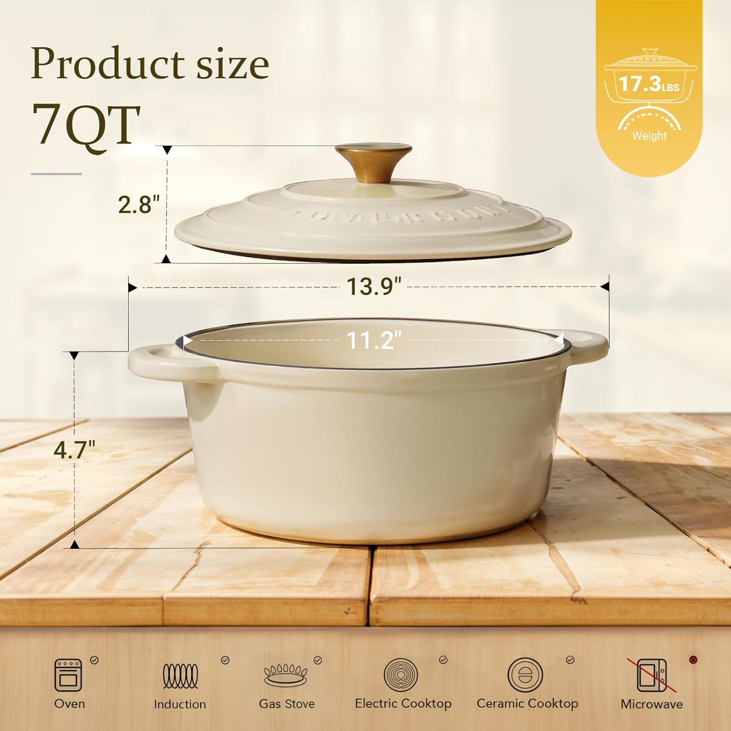 Cream white enameled cast iron Dutch oven with matching lid, displayed with included cookbook and cotton potholders — view 3