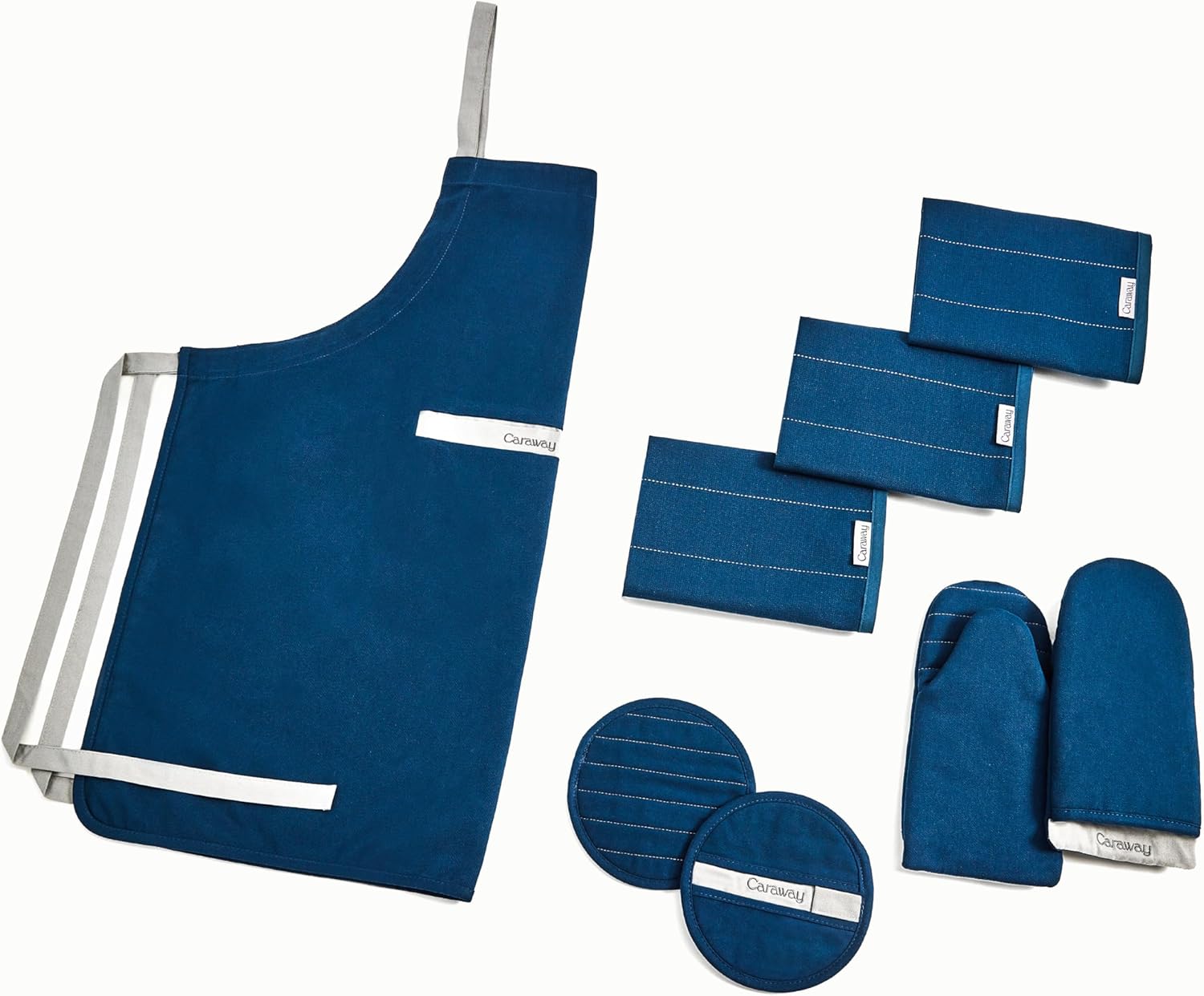 Four-piece organic cotton kitchen linen set including natural linen apron, matching pot holders, oven mitts, and tea towels — view 5