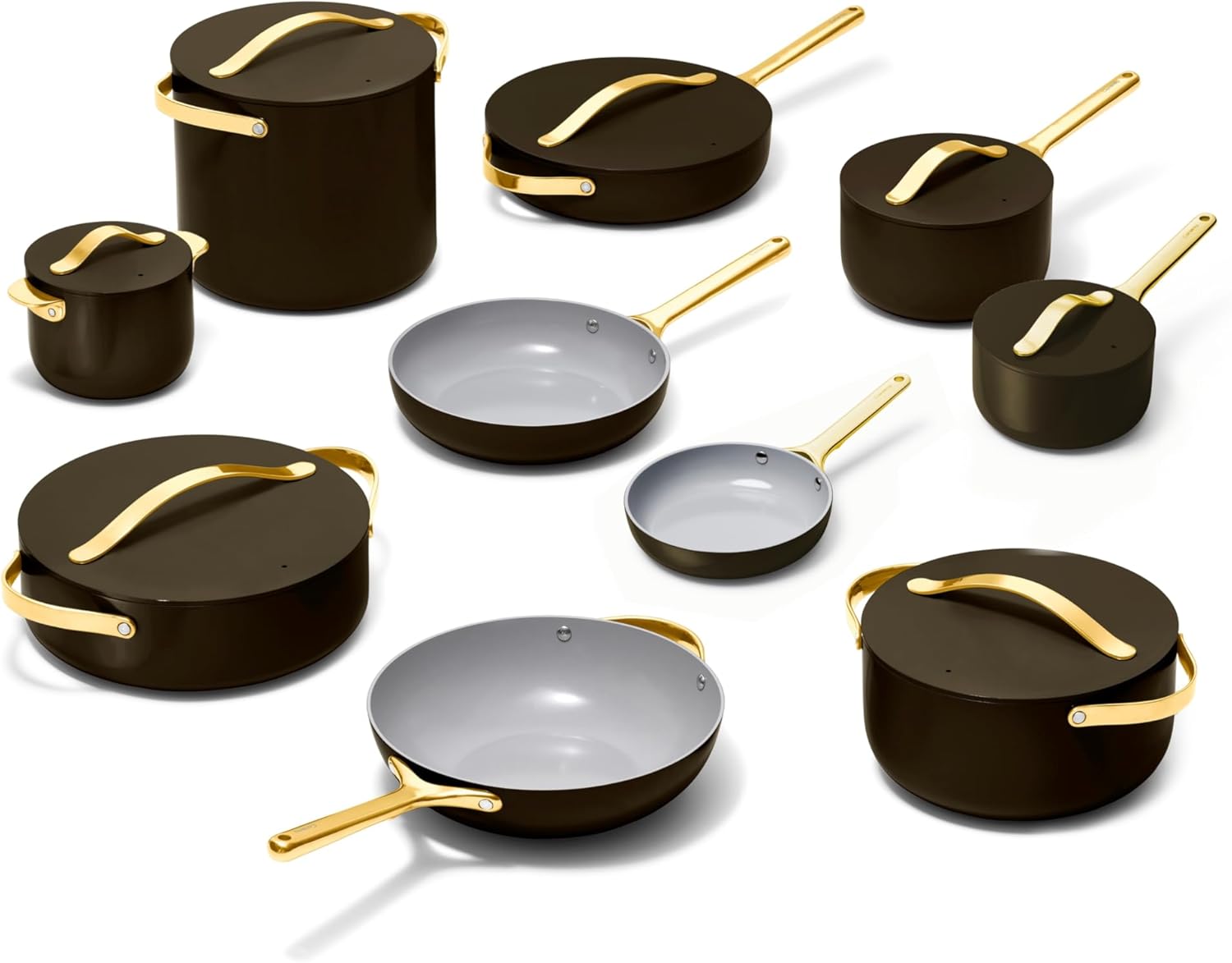 Caraway 24-piece black ceramic nonstick cookware set with fry pans, Dutch oven, and lids displayed on white background — front