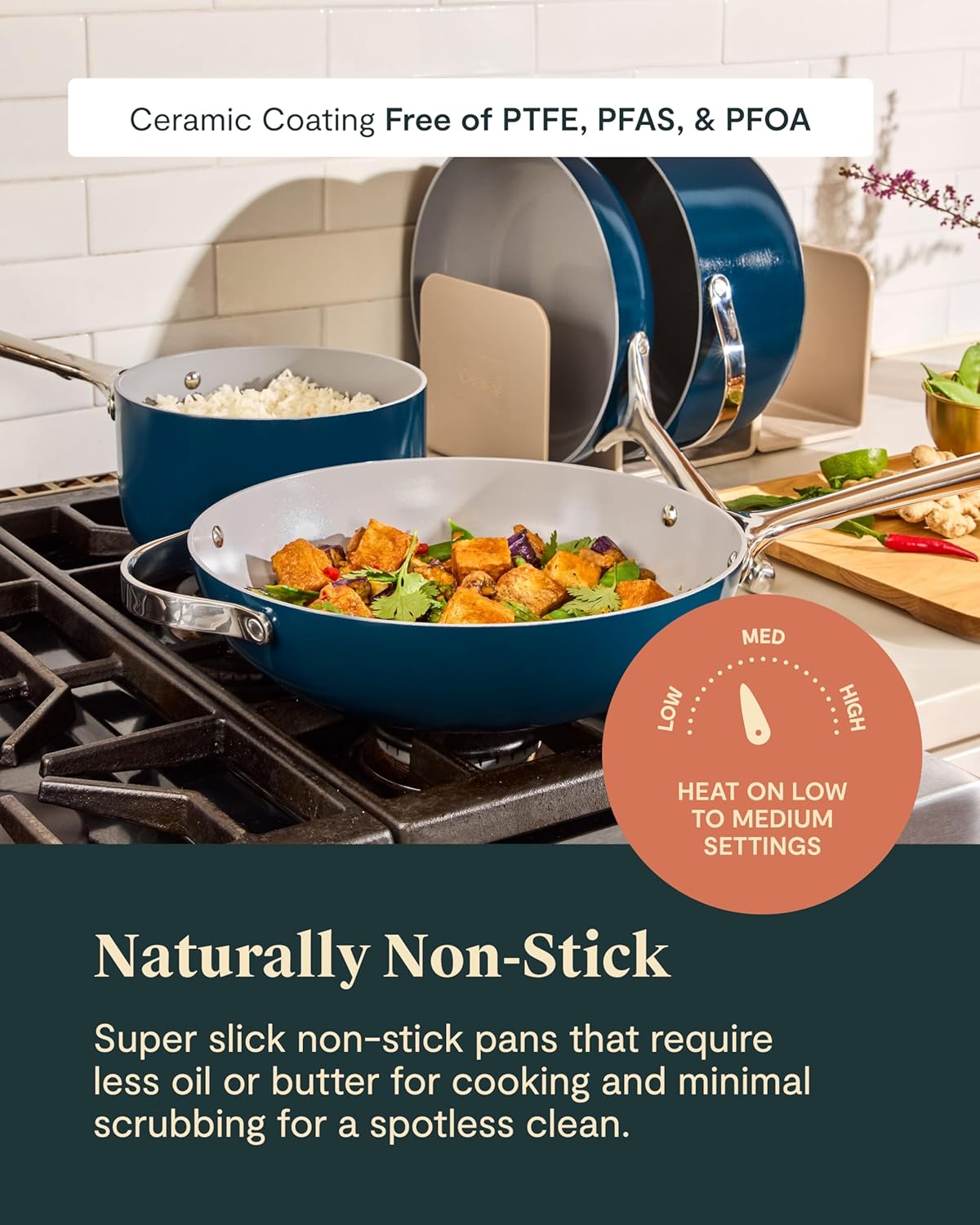 Caraway 24-piece black ceramic nonstick cookware set with fry pans, Dutch oven, and lids displayed on white background — view 2