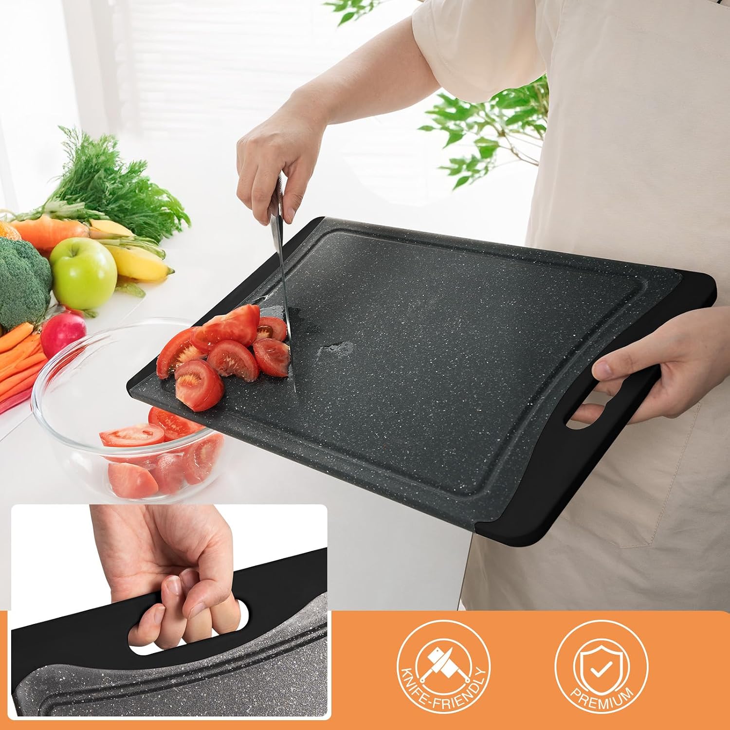 Dark grey plastic cutting board with juice grooves and easy-grip handles, part of 3-piece kitchen set — view 2