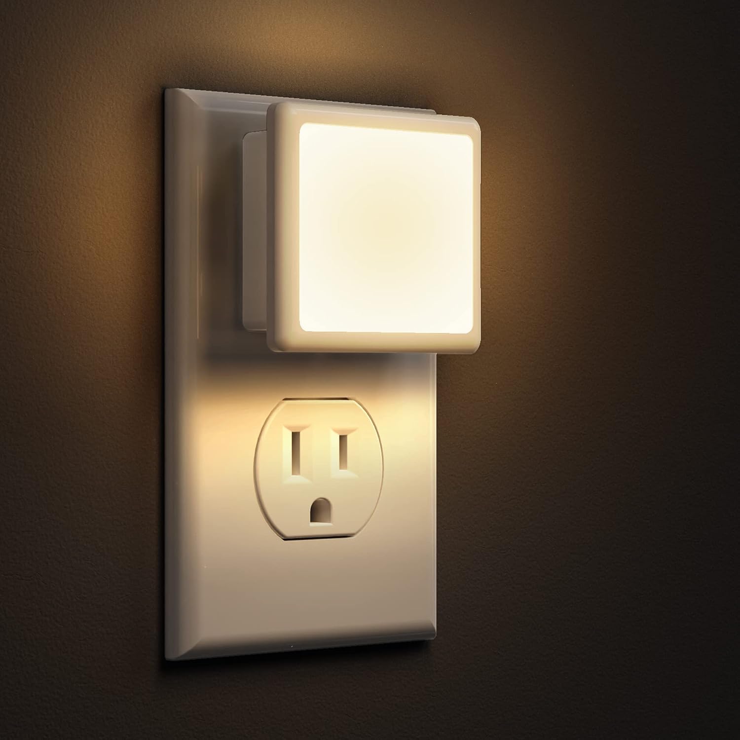Compact white plastic LED night light with plug-in wall socket design β view 1